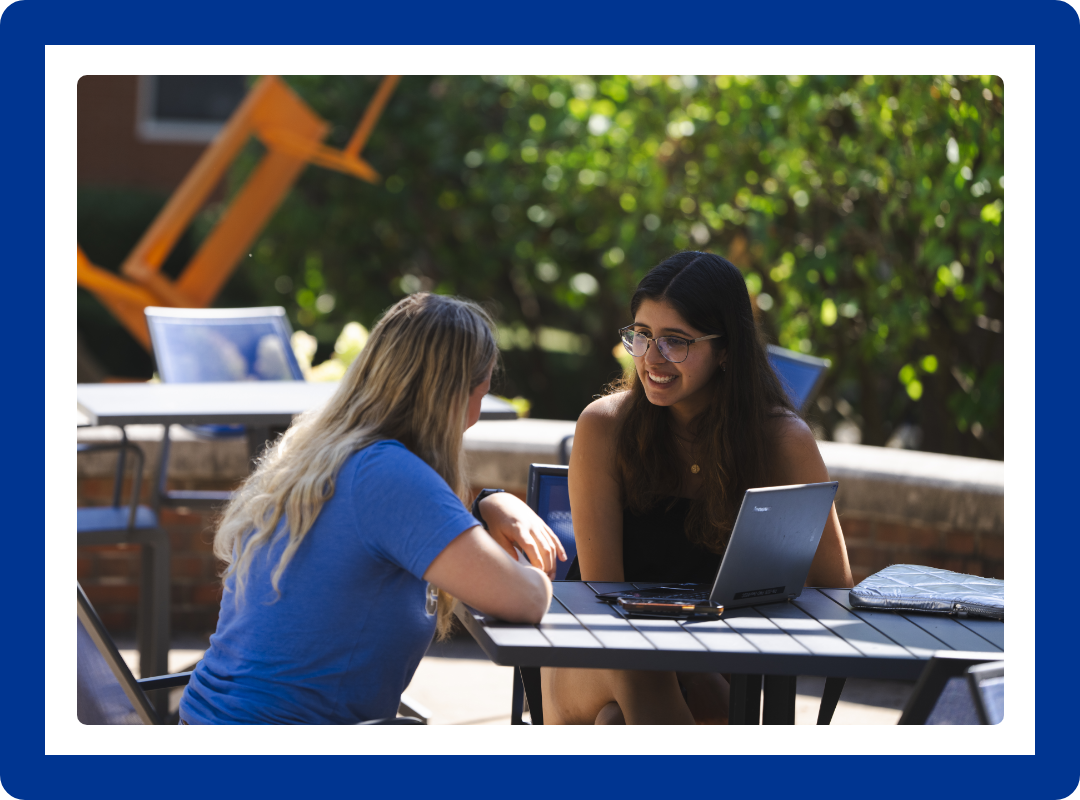 Students talk outside